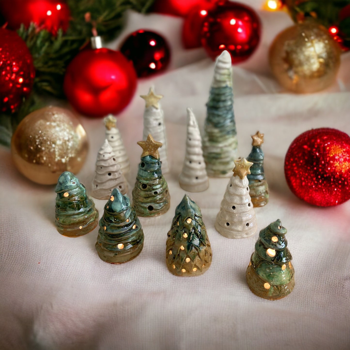 Handmade ceramic Christmas trees and festive ornaments